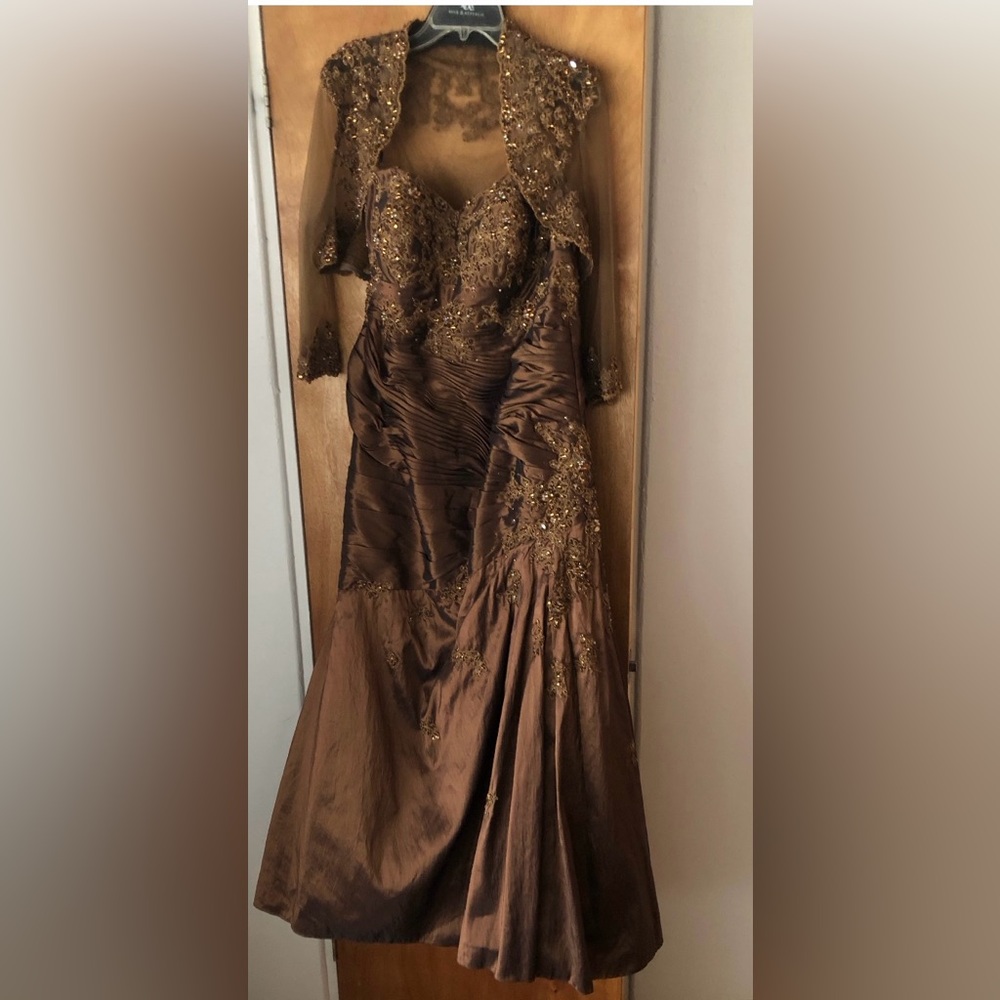 Mother of the Bride Dress. Size 14/16. Worn once.  Has a lot of intricate beads.